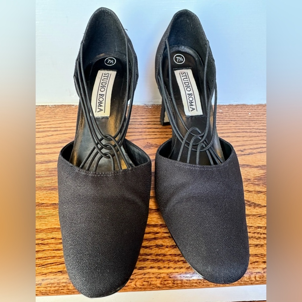 Women's Black Studio Roma thick heels with criss cross design. Material size 7.5